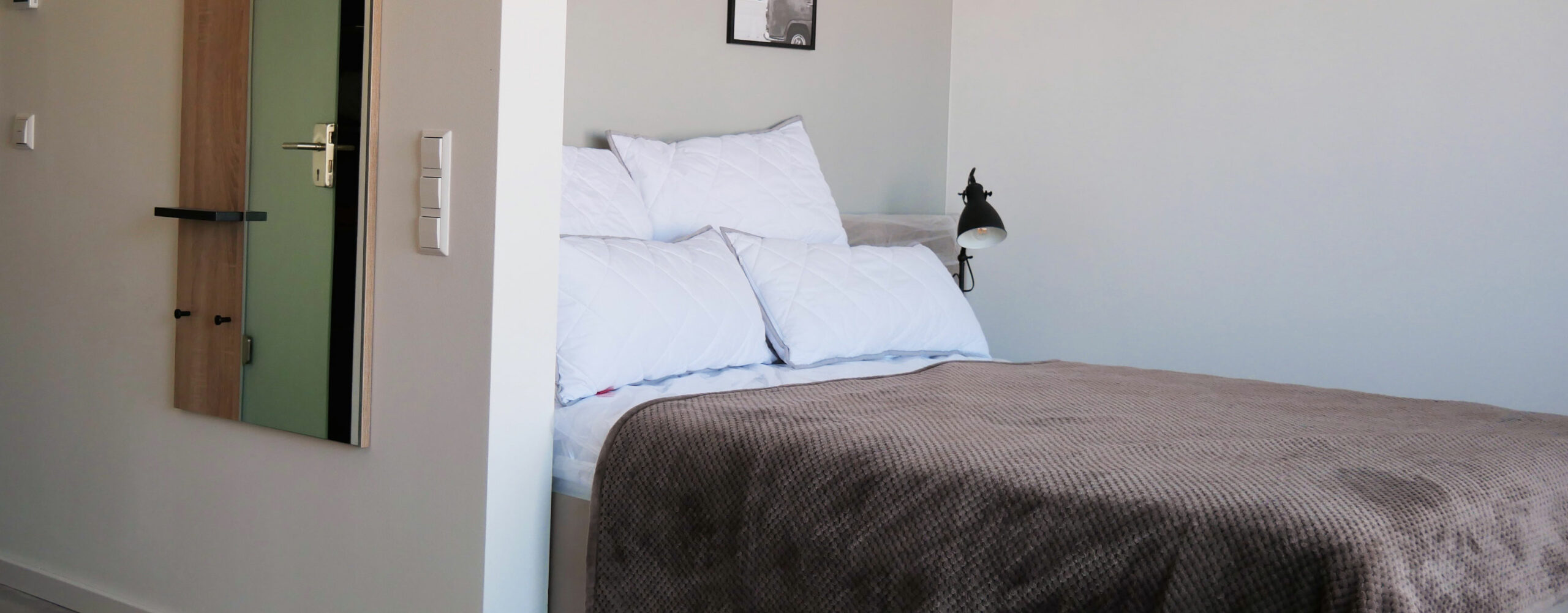 The bed in your PM-AM apartment ensures a restful night's sleep.